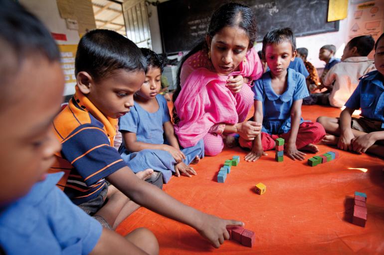 In Bangladesh, students sort and count blocks in Save the Children’s flagship early childhood care and development programme PROTEEVA (Promoting Talent Through Early Education).